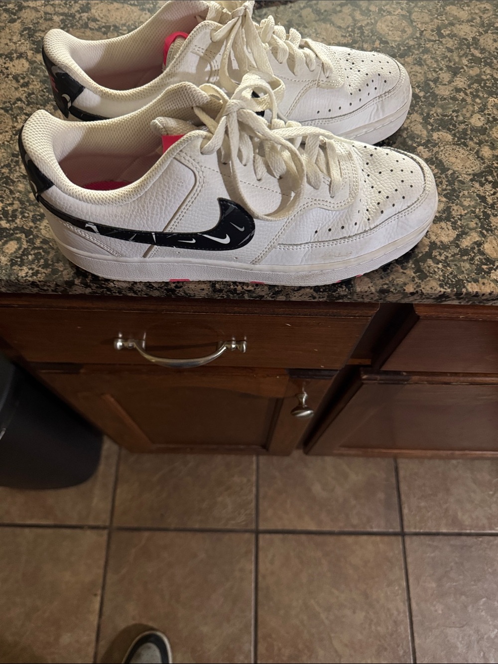 Nike Kids White Sneakers with Black Swoosh and Pink Lining